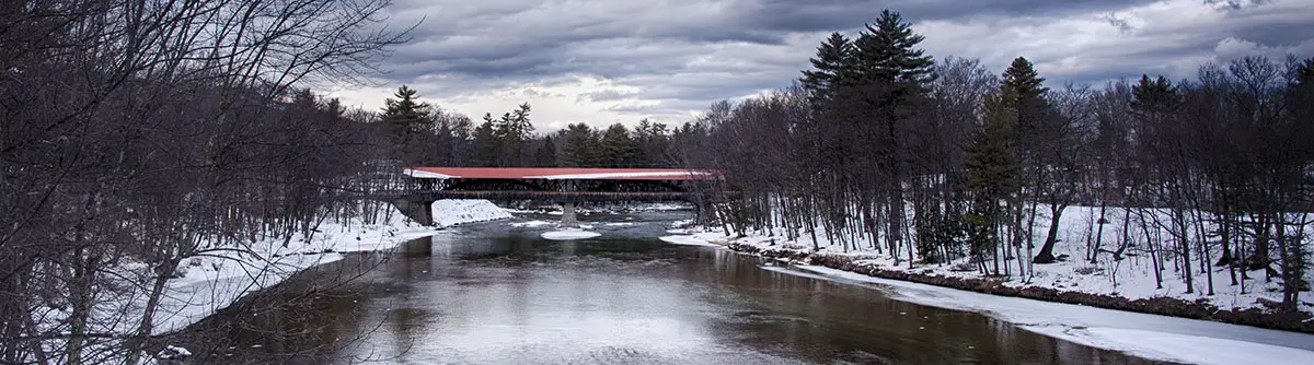 View of a covered bridge in North Conway, New Hampshire, in winter