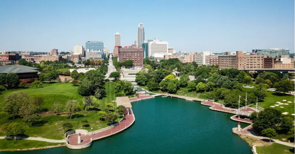 Aerial view of the Omaha Riverfront Trail and the Missouri River, with the Omaha, Nebraska, skyline in the background.